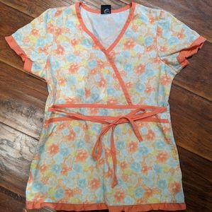 Orange floral nursing scrub top